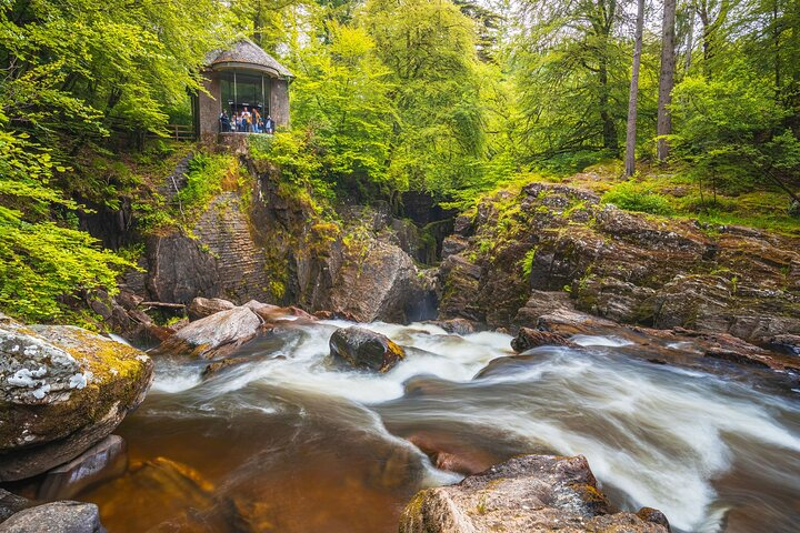 Experience the serene beauty of Scotland's rugged landscapes where cascading waters meet lush greenery perfect for adventurers seeking relaxation amidst nature's wonders. Ideal for nature lovers and whisky enthusiasts alike.